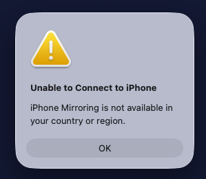 macOS dialog: Unable to Connect to iPhone. iPhone Mirroring is not available in your country or region.